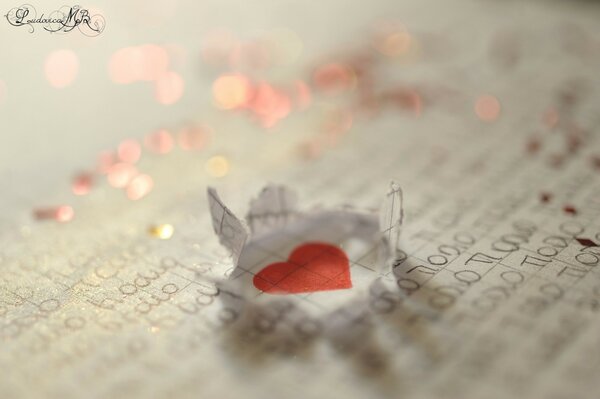 A heart made of paper on a sheet