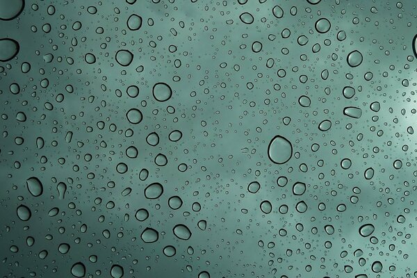 Water drops on the glass are green