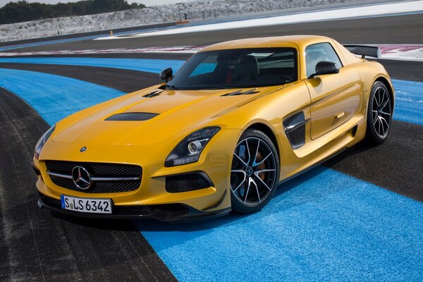 Yellow Mercedes on the race track