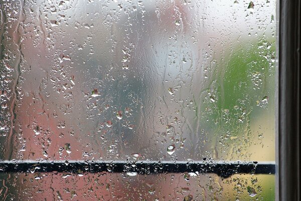 Photo of a window in the rain