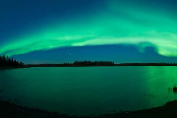 Mesmerizing northern lights by the river