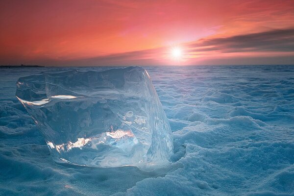 Snow on a red sky background