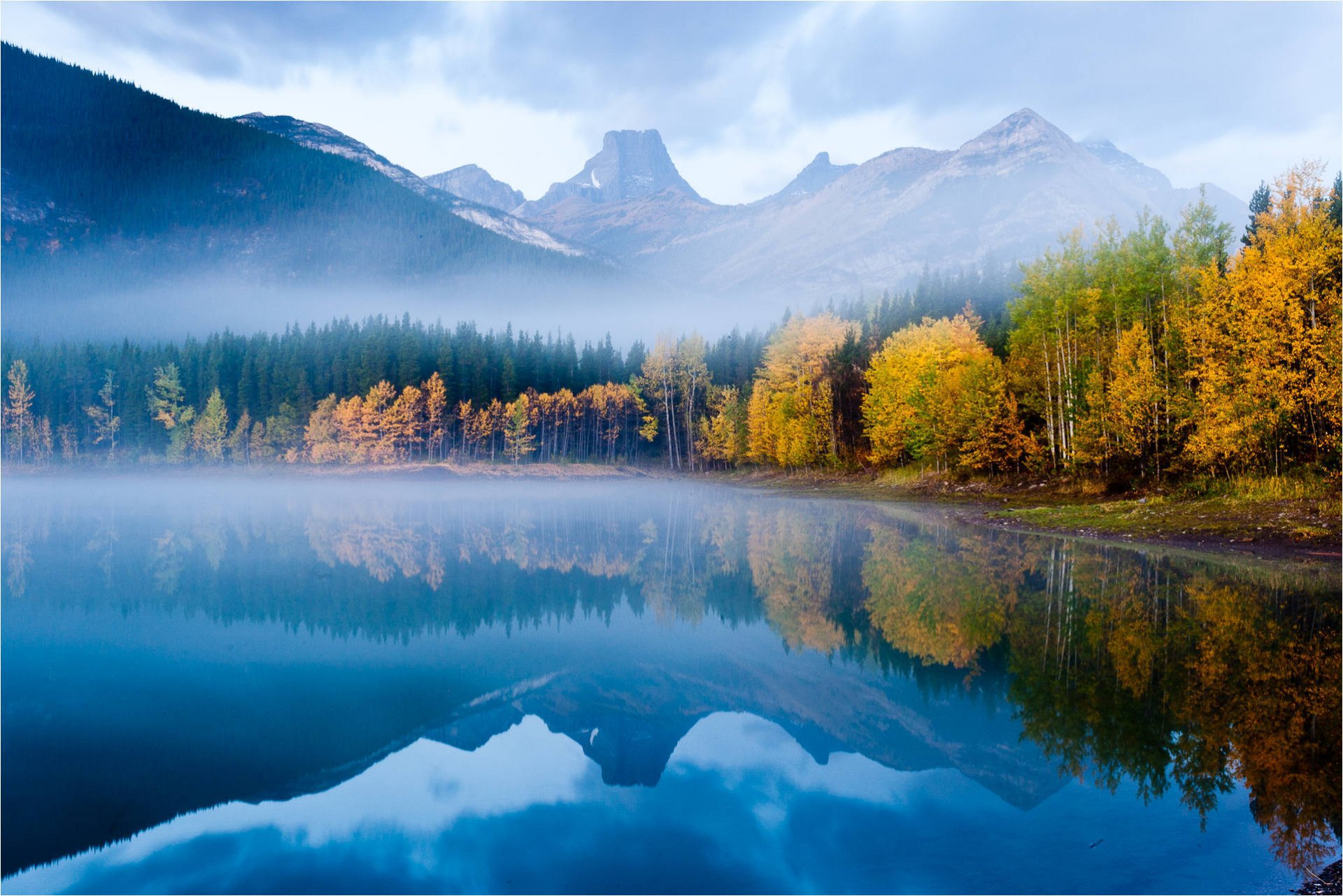 mountain lake autumn forest tops surface of reflection nature
