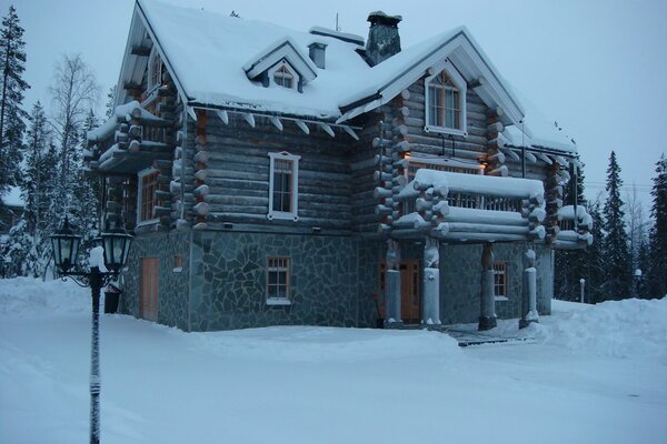 Winter forest hut in the forest