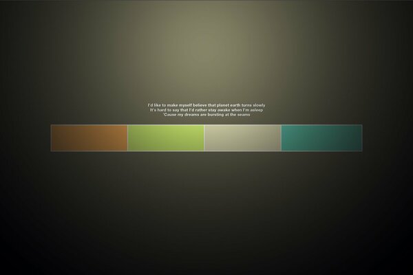 Faded colored bricks and phrases on a black background
