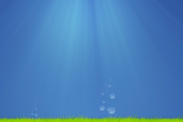 Bubbles under water. Blue Sea