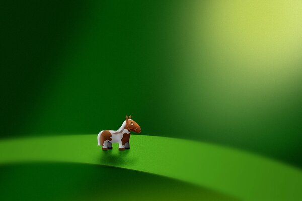 Little pony on a green leaf
