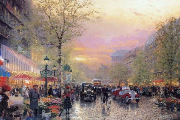 Evening boulevard in France with lanterns and cars