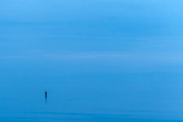 A man in the boundless sea