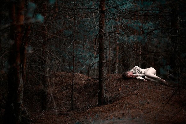 Forest, thicket, pine trees girl sleeping