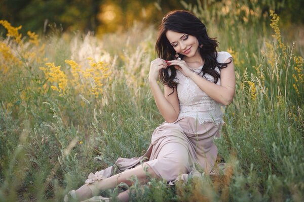 The girl in the field. Model. The brunette