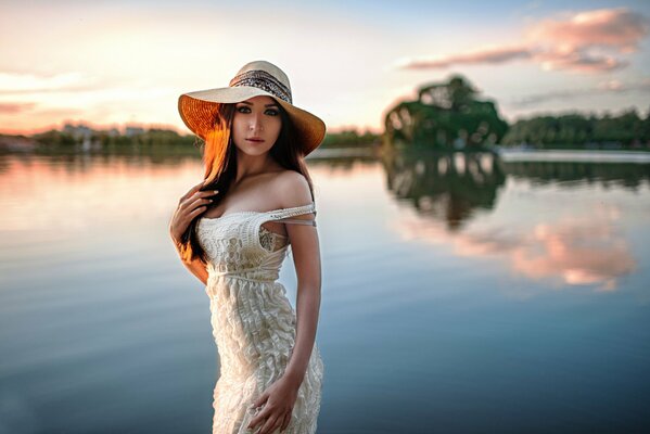 Natalia Rubanova in a hat against the background of nature