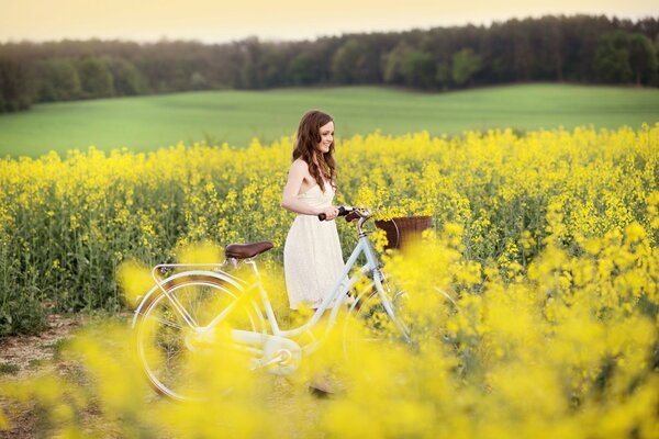 Summer mood of a girl in the field