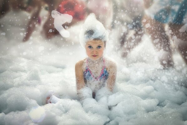 Girl having fun at a foam party