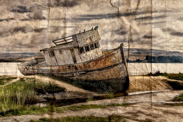 An abandoned old ship on the bank of the river