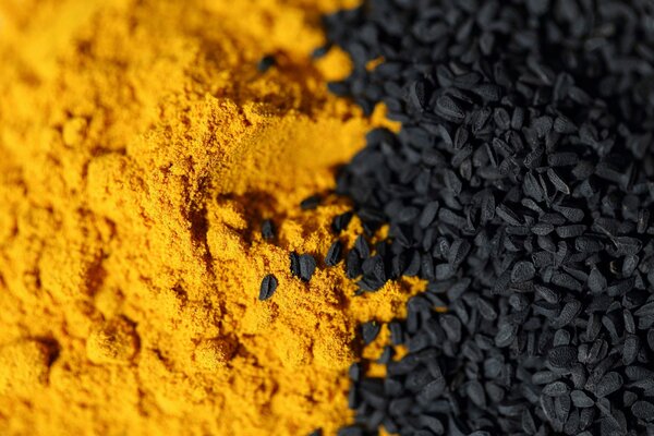 Loose spices and herbs, yellow and black