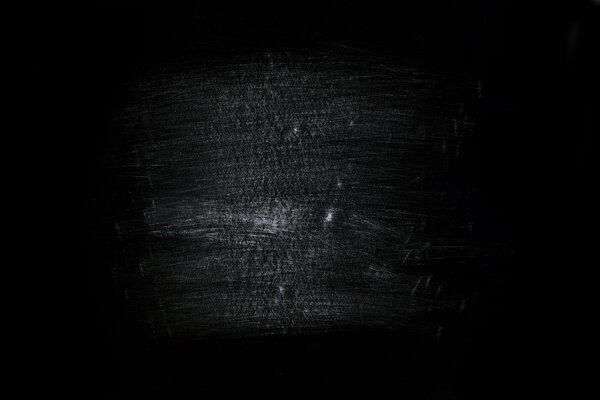 White scratches on a black background