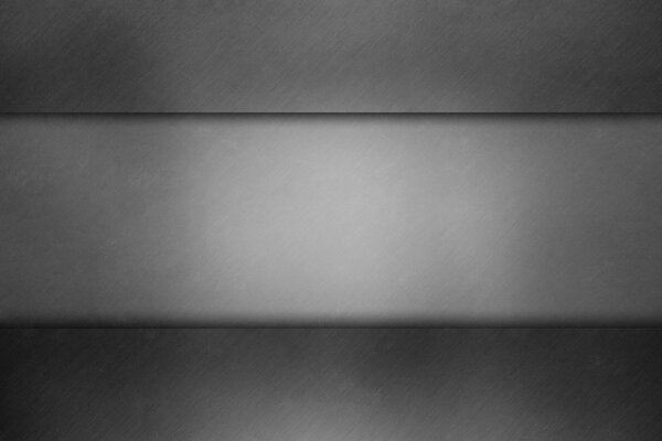 A gloomy light gray stripe on a dark background