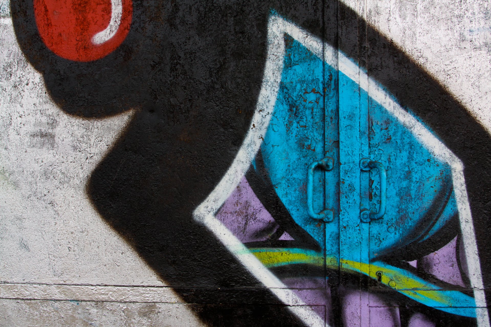 metal door handle painted colorful graffiti
