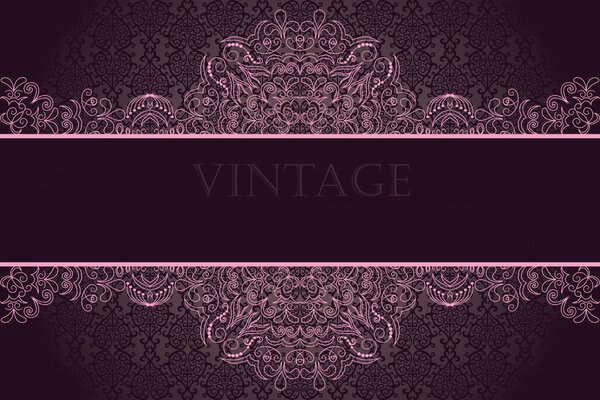 Vintage pink ornament on a dark background