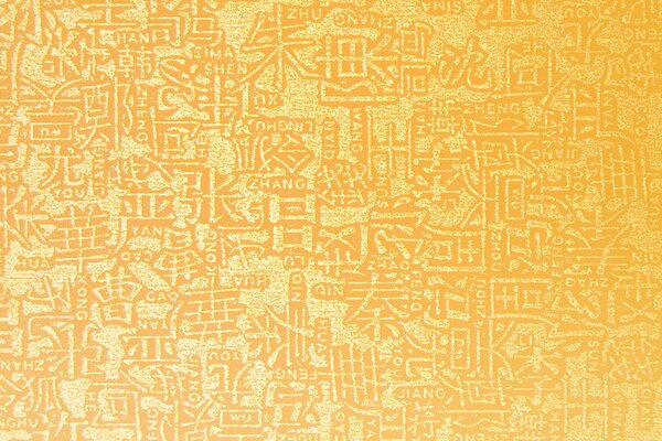 Golden yellow textured hieroglyphs