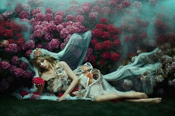 A girl with flowers and a veil