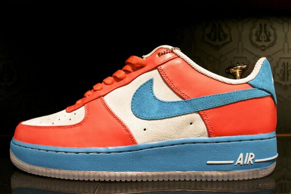 Red and blue nike sneakers photo
