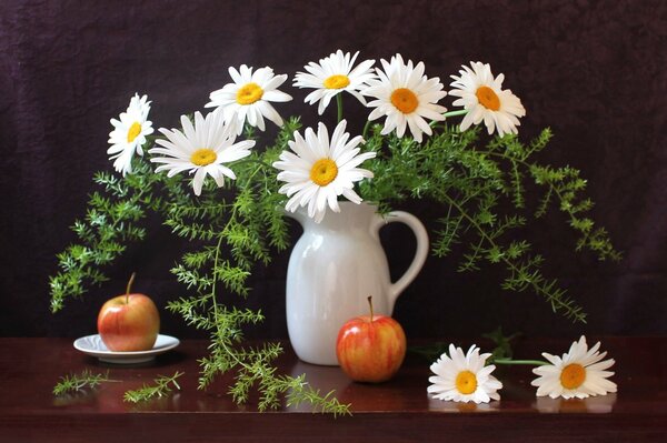 Still life consisting of a jug, apples and daisies