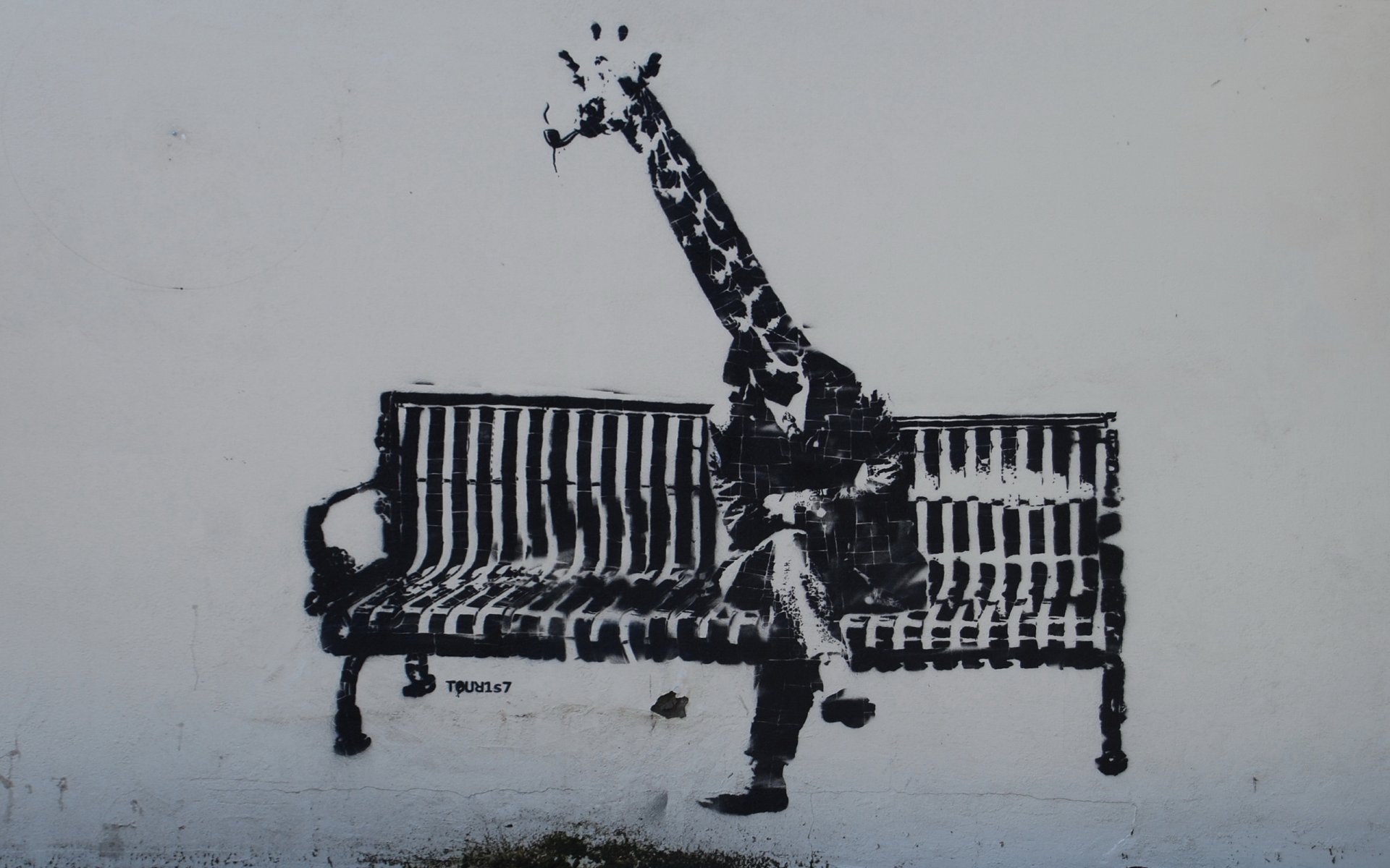 graffiti man giraffe wall bench