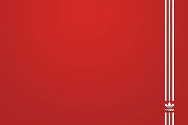 Adidas logo on a red background