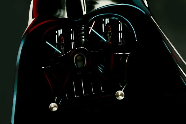A Jedi with a sword is reflected in Darth Vader s helmet
