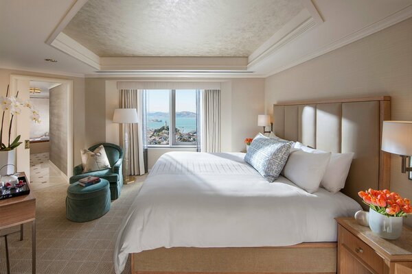 Bright bedroom in beige tones