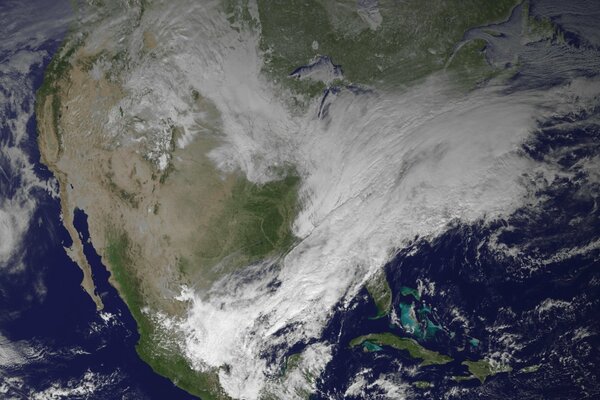 Airy white clouds over North America. Satellite photo