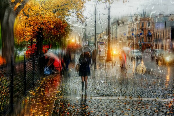 A look at the street in the rain behind the glass