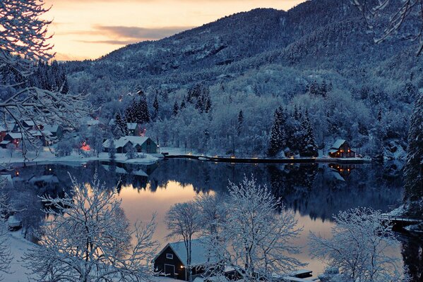 Winter Norwegian village on the shore
