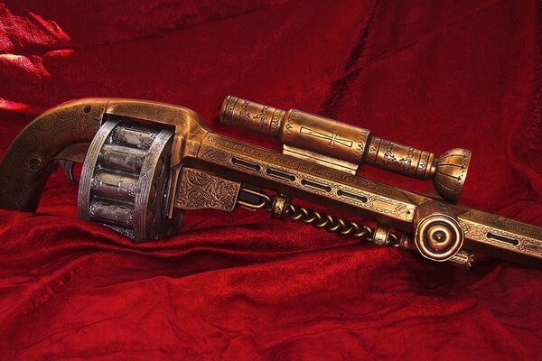 Bronze revolver on red velvet