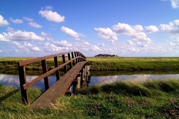 A fine day with beautiful clouds and a calm river