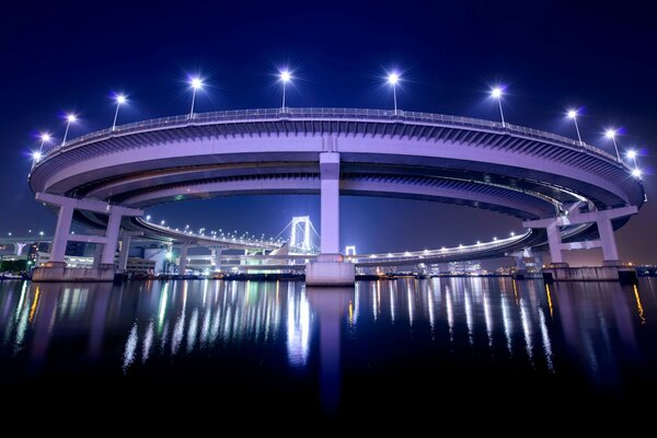 The capital of Japan is Tokyo. Lanterns in the reflection of the bay