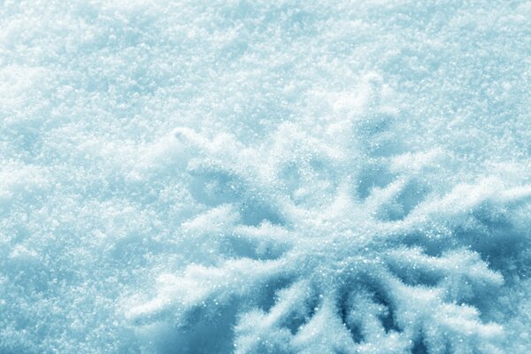A sick New Year s snowflake in the snow in winter