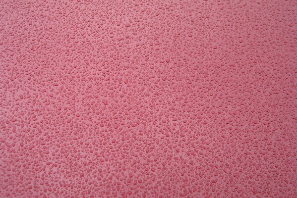 Lots of raindrops on a smooth surface