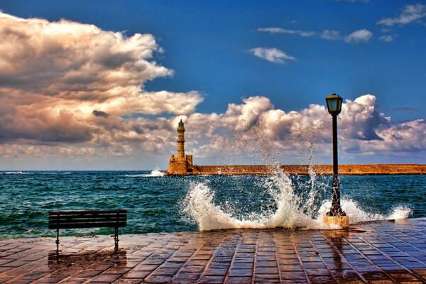 Sea surf with a beautiful lighthouse