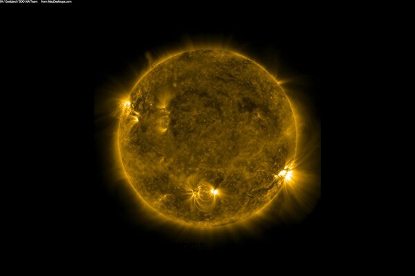 Blazing sun on a black background