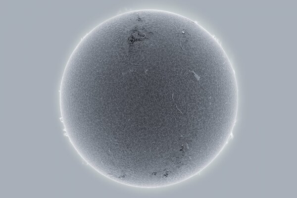 It is better to look at the Sun through a dark light filter