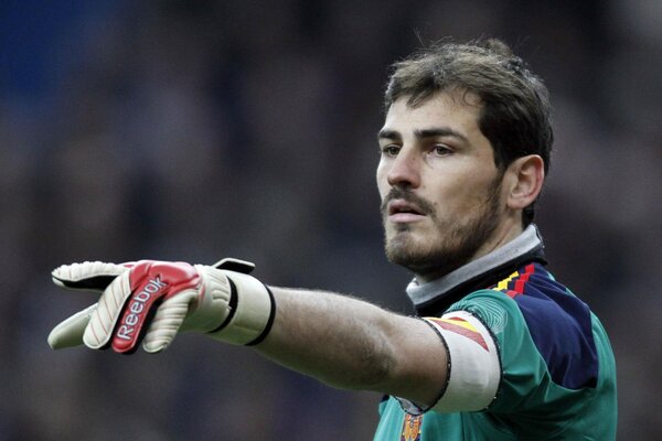 A player of the Spanish national team points his finger at the field