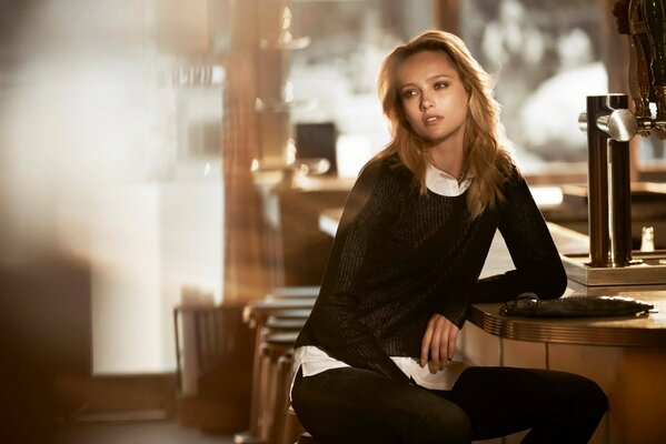 A model girl in a cafe