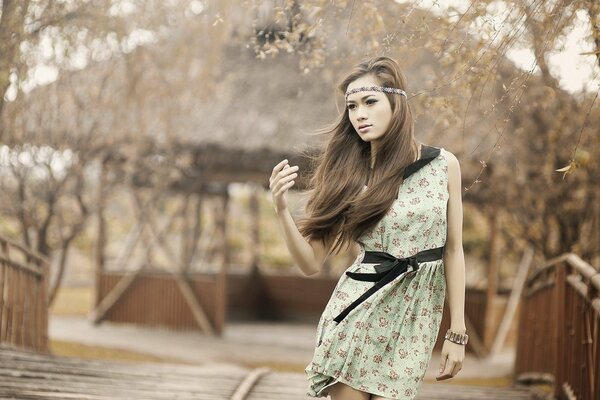 A girl of Asian appearance in nature