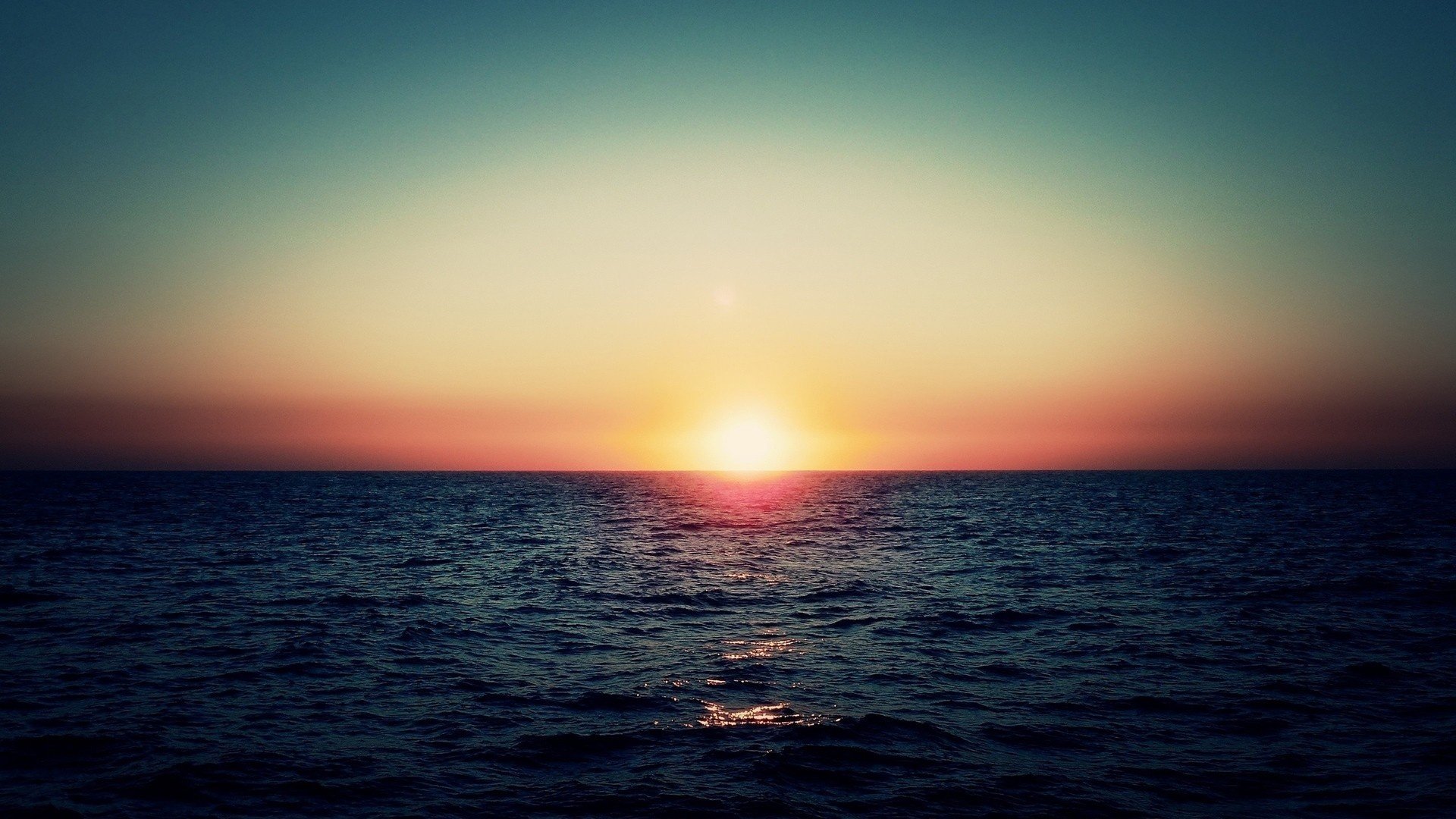 unset the sun sea horizon the evening the sky