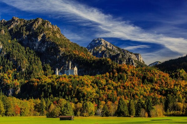 CASTLE IN THE FOREST IN THE MOUNTAINS OF BAVARIA