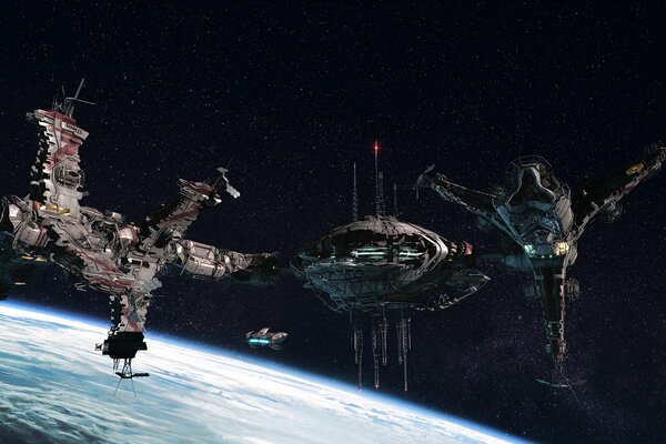 Fantastic spaceships on the background of the planet