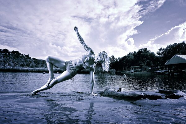 Yoga girls on the surface of the water